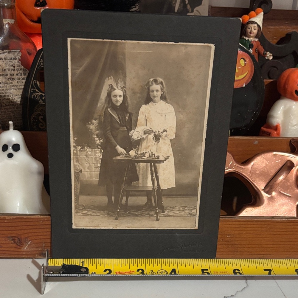 Antique Black and White Photograph with 2 girls arranging flowers